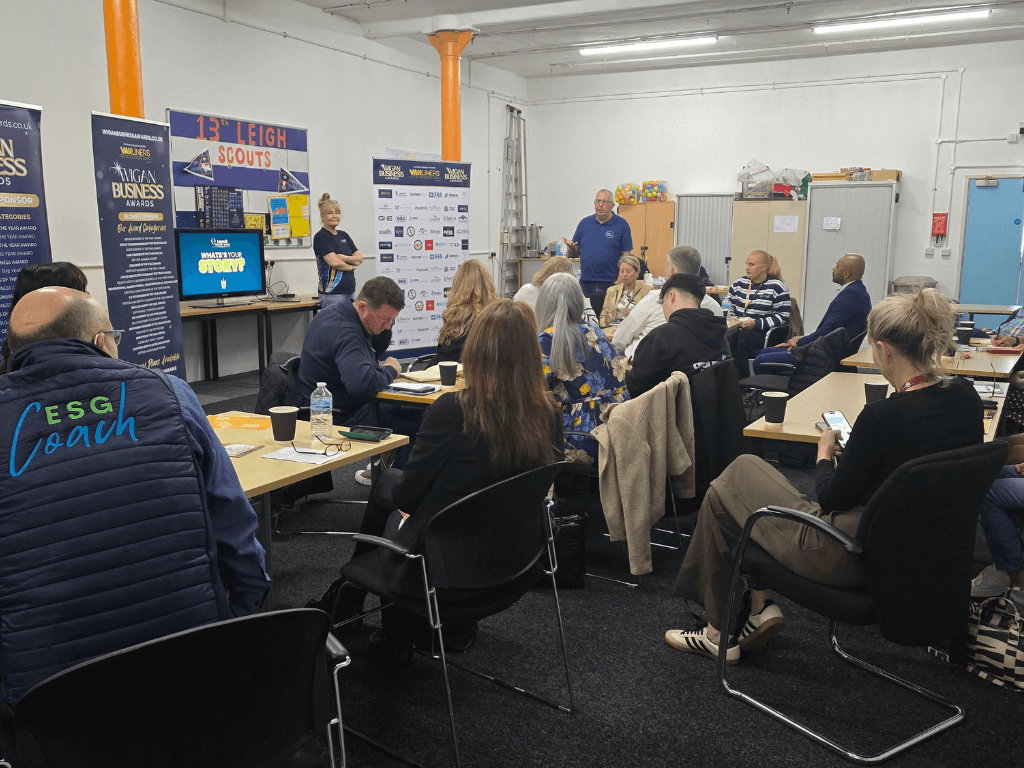 Business networking event taking place in the Community Room at Leigh Spinners Mill, with local professionals attending a workshop and presentation.